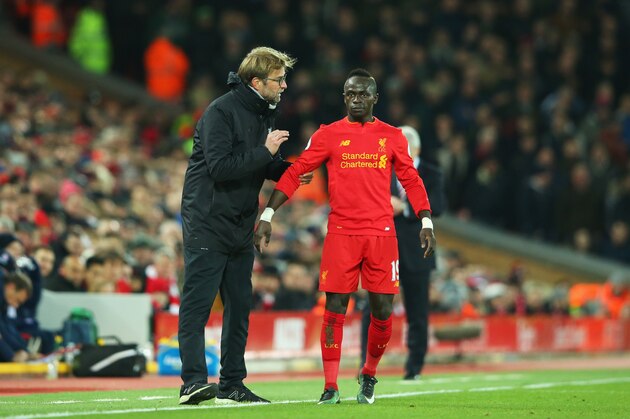 LIVERPOOL, ENGLAND - DECEMBER 27:  Jurgen Klopp manager of Liverpool gives instructions to Sadio Mane of Liverpool during the Premier League match between Liverpool and Stoke City at Anfield on December 27, 2016 in Liverpool, England.  (Photo by Alex Livesey/Getty Images)