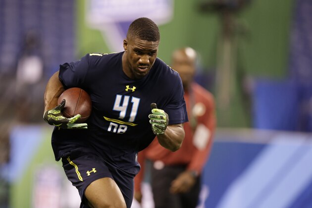 UCLA defensive back Fabian Moreau runs a drill at the NFL football scouting combine in Indianapolis, Monday, March 6, 2017. (AP Photo/Michael Conroy)