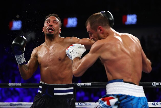 LAS VEGAS, NV - NOVEMBER 19:  Andre Ward and Sergey Kovalev exchange punches during their WBO/IBF/WBA Light Heavyweight Championship fight at  T-Mobile Arena on November 19, 2016 in Las Vegas, Nevada.  (Photo by Al Bello/Getty Images)
