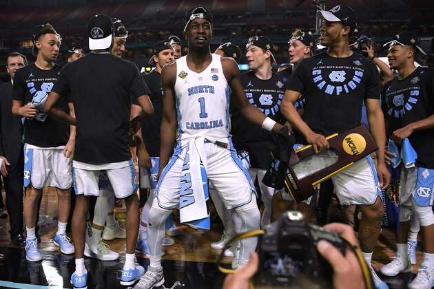 GLENDALE, AZ - APRIL 03: Players of the North Carolina Tar Heels celebrate following their 71-65 victory against the Gonzaga Bulldogs during the 2017 NCAA Men's Final Four Championship at University of Phoenix Stadium on April 3, 2017 in Glendale, Arizona. (Photo by Lance King/Getty Images)