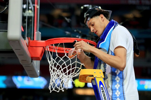 GLENDALE, AZ - APRIL 03:  Justin Jackson #44 of the North Carolina Tar Heels cuts the net after defeating the Gonzaga Bulldogs during the 2017 NCAA Men's Final Four National Championship game at University of Phoenix Stadium on April 3, 2017 in Glendale, Arizona. The Tar Heels defeated the Bulldogs 71-65.  (Photo by Tom Pennington/Getty Images)
