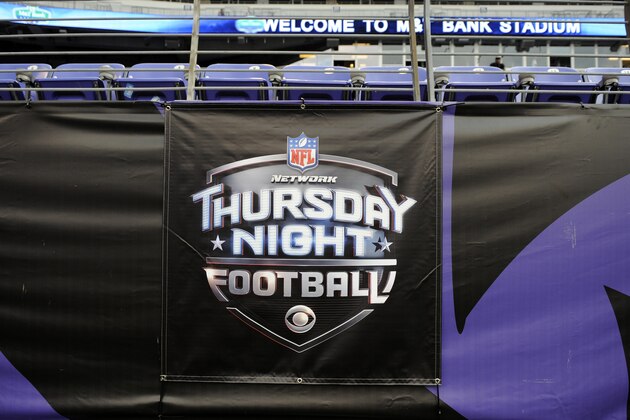 CBS' Thursday Night Football logo is seen on the set before an NFL football game between the Baltimore Ravens and the Pittsburgh Steelers, Thursday, Sept. 11, 2014, in Baltimore. (AP Photo/Nick Wass)