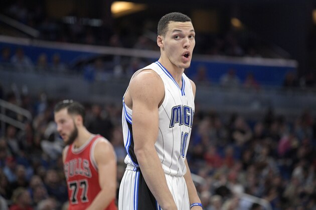 Orlando Magic forward Aaron Gordon, right, argues a call after receiving a charging foul in a collision with Chicago Bulls center Joffrey Lauvergne (77) during the second half of an NBA basketball game in Orlando, Fla., Wednesday, March 8, 2017. The Magic won 98-91. (AP Photo/Phelan M. Ebenhack)