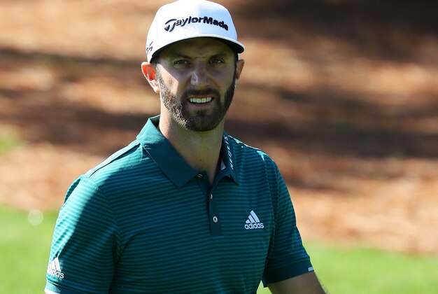 AUGUSTA, GA - APRIL 04:  Dustin Johnson of the United States looks on from the third hole during a practice round prior to the start of the 2017 Masters Tournament at Augusta National Golf Club on April 4, 2017 in Augusta, Georgia.  (Photo by Andrew Redington/Getty Images)