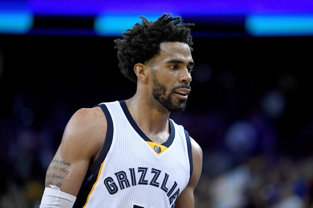 OAKLAND, CA - MARCH 26:  Mike Conley #11 of the Memphis Grizzlies looks on as he walks off the court against the Golden State Warriors during an NBA basketball game at ORACLE Arena on March 26, 2017 in Oakland, California. NOTE TO USER: User expressly acknowledges and agrees that, by downloading and or using this photograph, User is consenting to the terms and conditions of the Getty Images License Agreement.  (Photo by Thearon W. Henderson/Getty Images)