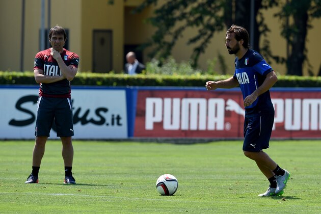 FLORENCE, ITALY - JUNE 08:  Head coach Antonio Conte (L) and Andrea Pirlo during an Italy training session at Coverciano on June 8, 2015 in Florence, Italy.  (Photo by Claudio Villa/Getty Images)