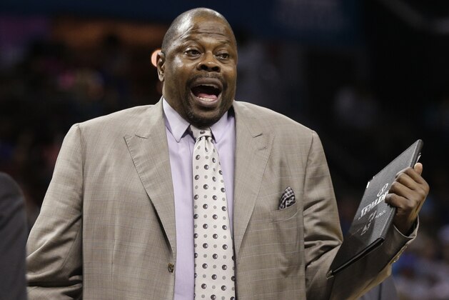 FILE - In this April 13, 2015, file photo, Charlotte Hornets assistant coach Patrick Ewing argues a call during the second half of an NBA basketball game against the Houston Rockets in Charlotte, N.C. Summer league is a chance for players to get noticed and maybe have a shot at making it in the NBA. Same goes for coaches. That's why NBA assistants like Juwan Howard and Patrick Ewing embraced the chance to run rosters this summer. (AP Photo/Chuck Burton, File)