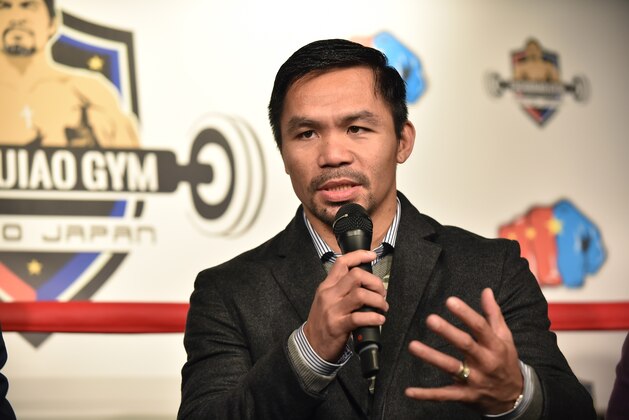 WBO welterweight world champion Manny Pacquiao speaks during a press conference at his boxing gym in Tokyo on November 25, 2016.
WBO welterweight world champion Manny Pacquiao on November 25 kept alive hopes for a rematch with Floyd Mayweather, saying the epic clash was 'possible' but only if his arch rival returns to the ring. / AFP / KAZUHIRO NOGI        (Photo credit should read KAZUHIRO NOGI/AFP/Getty Images)