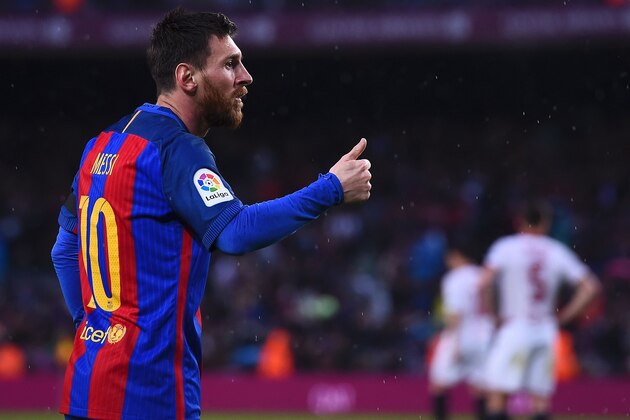 Barcelona's Argentinian forward Lionel Messi gestures as he celebrates his goal during the Spanish league football match FC Barcelona vs Sevilla FC at the Camp Nou stadium in Barcelona on April 5, 2017. / AFP PHOTO / Josep LAGO        (Photo credit should read JOSEP LAGO/AFP/Getty Images)