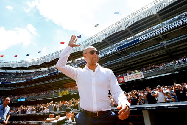 NEW YORK, NY - AUGUST 14: Former New York Yankee Derek Jeter waves as he is introduced during a ceremony honoring Mariano Rivera before a game between the Tampa Bay Rays and the New York Yankees at Yankee Stadium on August 14,  in the Bronx borough of New York City. (Photo by Rich Schultz/Getty Images)