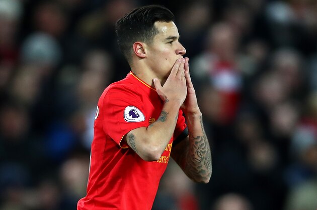 LIVERPOOL, ENGLAND - APRIL 05:  Philippe Coutinho of Liverpool celebrates scoring his sides first goal during the Premier League match between Liverpool and AFC Bournemouth at Anfield on April 5, 2017 in Liverpool, England.  (Photo by Clive Brunskill/Getty Images)