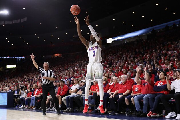 TUCSON, AZ - JANUARY 29:  Kobi Simmons #2 of the Arizona Wildcats attempts a three point shot against the Washington Huskies during the first half of the college basketball game at McKale Center on January 29, 2017 in Tucson, Arizona.  The Wildcats defeated the Huskies 77-66. (Photo by Christian Petersen/Getty Images)