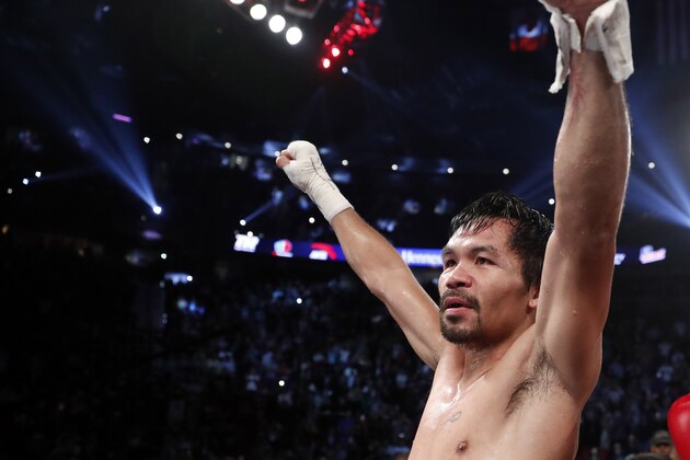 Manny Pacquiao, of the Philippines, celebrates after defeating Jessie Vargas in a WBO welterweight title boxing match Saturday, Nov. 5, 2016, in Las Vegas. (AP Photo/Isaac Brekken)