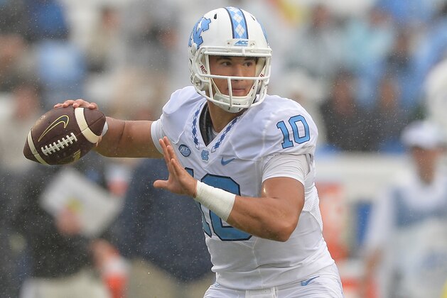 CHAPEL HILL, NC - SEPTEMBER 26:  Mitch Trubisky #10 of the North Carolina Tar Heels throws against the Delaware Fightin Blue Hens during their game at Kenan Stadium on September 26, 2015 in Chapel Hill, North Carolina. North Carolina won 41-14.  (Photo by Grant Halverson/Getty Images)