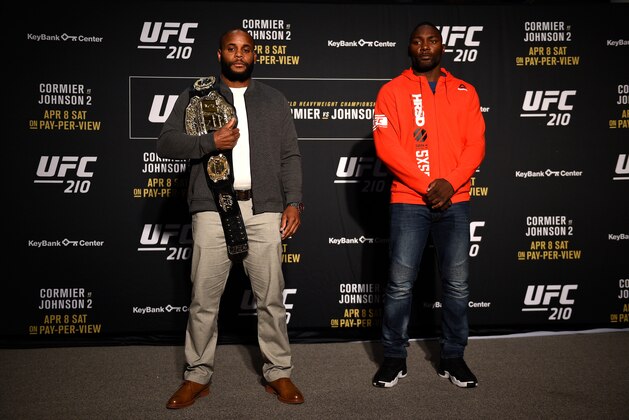 BUFFALO, NEW YORK - APRIL 05:  (L-R) UFC Light Heavy Daniel Cormier and Anthony Johnson face off during the UFC 210 Ultimate Media Day inside the KeyBank Center on April 5, 2017 in Buffalo, New York. (Photo by Jeff Bottari/Zuffa LLC/Zuffa LLC via Getty Images)
