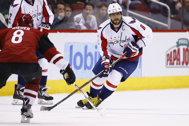 Washington Capitals' Alex Ovechkin, right, skates with the puck against Arizona Coyotes' Tobias Rieder, left, during the first period of an NHL hockey game Friday, March 31, 2017, in Glendale, Ariz. The Coyotes defeated the Capitals 6-3. (AP Photo/Ross D. Franklin)