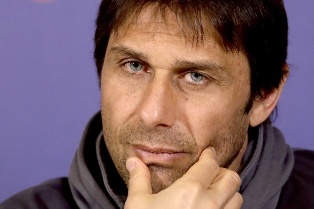 Chelsea's manager Antonio Conte listens to a journalist's question during a press conference at their training facilities in Stoke d'Abernon, on the outskirts of London, Tuesday, April 4, 2017. The press conference Tuesday was to preview their English Premier League soccer match against Manchester City on Wednesday. (AP Photo/Matt Dunham)
