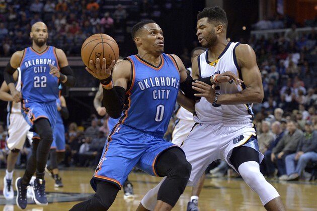 Oklahoma City Thunder guard Russell Westbrook (0) drives against Memphis Grizzlies guard Andrew Harrison, right, during the first half of an NBA basketball game Wednesday, April 5, 2017, in Memphis, Tenn. (AP Photo/Brandon Dill)