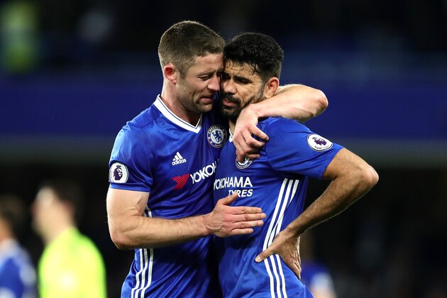 LONDON, ENGLAND - APRIL 05:  Gary Cahill (L) of Chelsea embraces Diego Costa at the end of the Premier League match between Chelsea and Manchester City at Stamford Bridge on April 5, 2017 in London, England.  (Photo by Chris Brunskill Ltd/Getty Images)