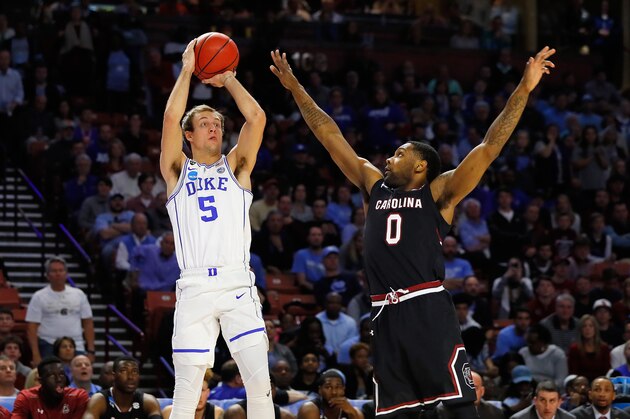GREENVILLE, SC - MARCH 19:  Luke Kennard #5 of the Duke Blue Devils shoots the ball against Sindarius Thornwell #0 of the South Carolina Gamecocks in the first half during the second round of the 2017 NCAA Men's Basketball Tournament at Bon Secours Wellness Arena on March 19, 2017 in Greenville, South Carolina.  (Photo by Kevin C. Cox/Getty Images)
