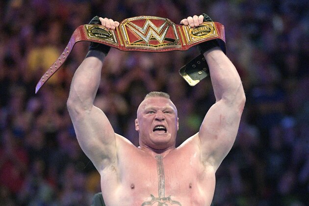 IMAGE DISTRIBUTED FOR WWE - Brock Lesner raises the WWE Universal Championship after defeating Goldberg during WrestleMania 33 on Sunday, April 2, 2017, in Orlando, Fla. (Phelan M. Ebenhack/AP Images for WWE)