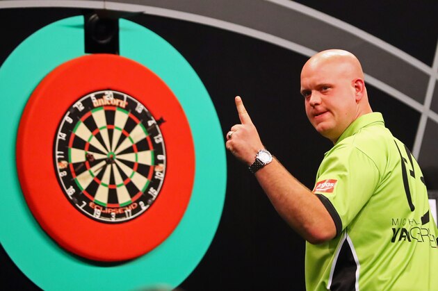 ROTTERDAM, NETHERLANDS - MAY 12:  Michael van Gerwen of the Netherlands celebrates a shot in his match against Phil 'The Power' Taylor of England during the Darts Betway Premier League Night 15 at Rotterdam Ahoy on May 12, 2016 in Rotterdam, .  (Photo by Dean Mouhtaropoulos/Getty Images)