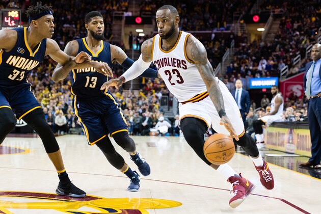 CLEVELAND, OH - APRIL 2: Myles Turner #33 and Paul George #13 of the Indiana Pacers try to stop LeBron James #23 of the Cleveland Cavaliers during the second half at Quicken Loans Arena on April 2, 2017 in Cleveland, Ohio. The Cavaliers defeated the Pacers 135-130 in double overtime. NOTE TO USER: User expressly acknowledges and agrees that, by downloading and/or using this photograph, user is consenting to the terms and conditions of the Getty Images License Agreement. (Photo by Jason Miller/Getty Images)