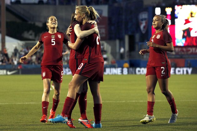 FRISCO, TX - APRIL 06: Allie Long #20 of the U.S. celebrates with Rose Lavelle #16, Kelley O'Hara #5 and Mallory Pugh #2 during the first half of the International Friendly soccer match against Russia at Toyota Stadium on April 6, 2017 in Frisco, Texas. (Photo by Mike Stone/Getty Images)