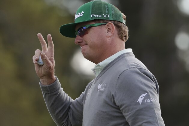 Charley Hoffman waves after fishing the first round of the Masters golf tournament Thursday, April 6, 2017, in Augusta, Ga. (AP Photo/David Goldman)