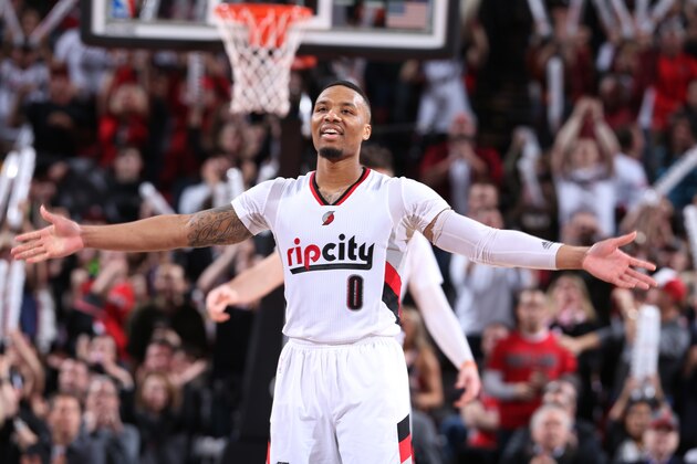 PORTLAND, OR - MARCH 30:  Damian Lillard #0 of the Portland Trail Blazers celebrates during the game against the Houston Rockets on March 30, 2017 at the Moda Center in Portland, Oregon. NOTE TO USER: User expressly acknowledges and agrees that, by downloading and/or using this photograph, user is consenting to the terms and conditions of the Getty Images License Agreement. Mandatory Copyright Notice: Copyright 2017 NBAE (Photo by Sam Forencich/NBAE via Getty Images)