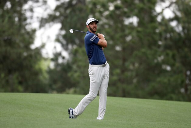 AUGUSTA, GA - APRIL 03:  Dustin Johnson of the United States hits a shot on the 15th hole during a practice round prior to the start of the 2017 Masters Tournament at Augusta National Golf Club on April 3, 2017 in Augusta, Georgia.  (Photo by Rob Carr/Getty Images)