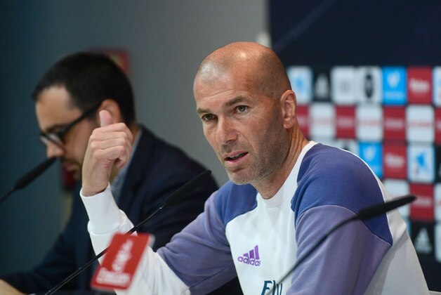 Real Madrid's French coach Zinedine Zidane getures during a press conference at Valdebebas Sport City, on April 7, 2017 on the eve of their Spanish League football match Club Atletico de Madrid vs Real Madrid. / AFP PHOTO / PIERRE-PHILIPPE MARCOU        (Photo credit should read PIERRE-PHILIPPE MARCOU/AFP/Getty Images)