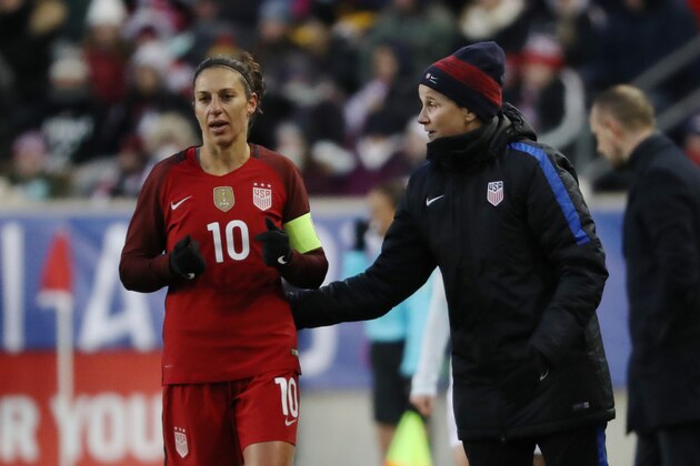 United States head coach Jill Ellis speaks to player Carli Lloyd as the United States and England women's national teams play in the SheBelieves Cup in Harrison, NJ, on March 4, 2017.  / AFP PHOTO / DOMINICK REUTER        (Photo credit should read DOMINICK REUTER/AFP/Getty Images)