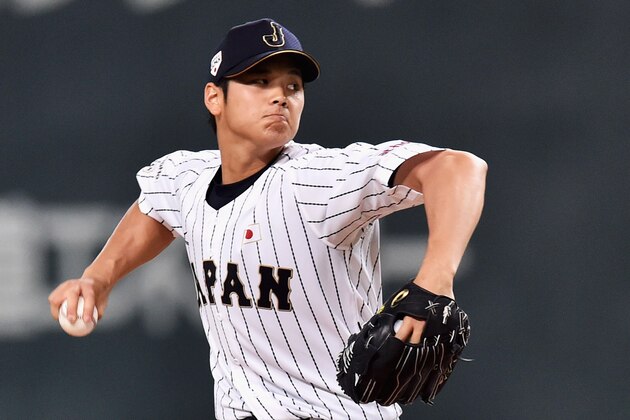SAPPORO, JAPAN - NOVEMBER 08:  Starting pitcher Shohei Otani #16 throws in the top of second inning during the WBSC Premier 12 match between Japan and South Korea at the Sapporo Dome on November 8, 2015 in Sapporo, Hokkaido, Japan.  (Photo by Atsushi Tomura/Getty Images)