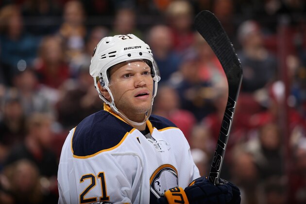 GLENDALE, AZ - FEBRUARY 26:  Kyle Okposo #21 of the Buffalo Sabres awaits a face-off during the first period of the NHL game against the Arizona Coyotes at Gila River Arena on February 26, 2017 in Glendale, Arizona.  (Photo by Christian Petersen/Getty Images)