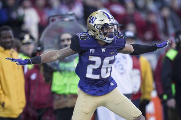 SEATTLE, WA - NOVEMBER 27: Defensive back Sidney Jones #26 of the Washington Huskies celebrates an in incomplete pass during the first half of play against the Washington State Cougars during a football game at Husky Stadium on November 27, 2015 in Seattle, Washington. (Photo by Stephen Brashear/Getty Images)