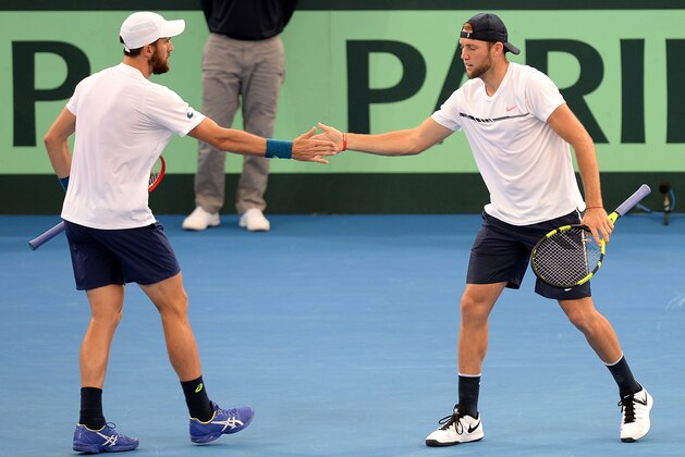 BRISBANE, AUSTRALIA - APRIL 07: Steve Johnson and Jack Sock of the USA celebrate a point in their doubles match against John Peers and Sam Groth of Australia during the Davis Cup World Group Quarterfinals between Australia and the USA at Pat Rafter Arena on April 7, 2017 in Brisbane, Australia.  (Photo by Bradley Kanaris/Getty Images)
