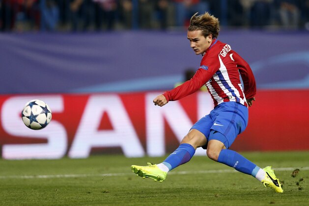 Atletico's Antoine Griezmann kicks the ball during the Champions League round of 16 second leg soccer match between Atletico Madrid and Bayer Leverkusen at the Vicente Calderon stadium in Madrid, Spain, Wednesday, March 15, 2017. (AP Photo/Daniel Ochoa de Olza)