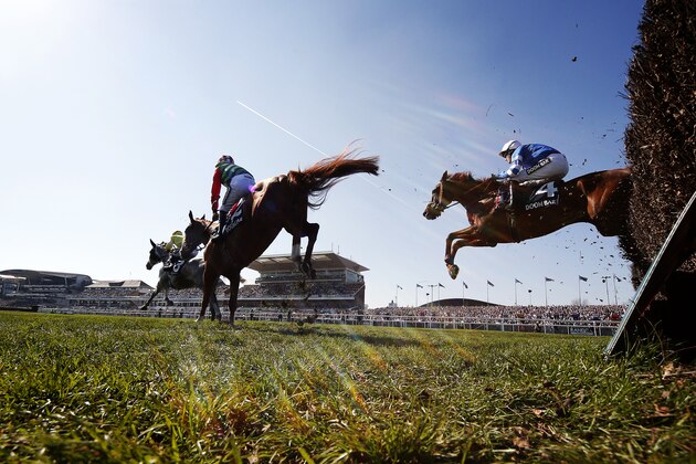 LIVERPOOL, ENGLAND - APRIL 08: Nick Scholfield riding San Benedeto (R) on their way to winning The Doom Bar Maghull Novicesâ Steeple Chase at Aintree Racecourse on April 8, 2017 in Liverpool, England. (Photo by Alan Crowhurst/Getty Images)
