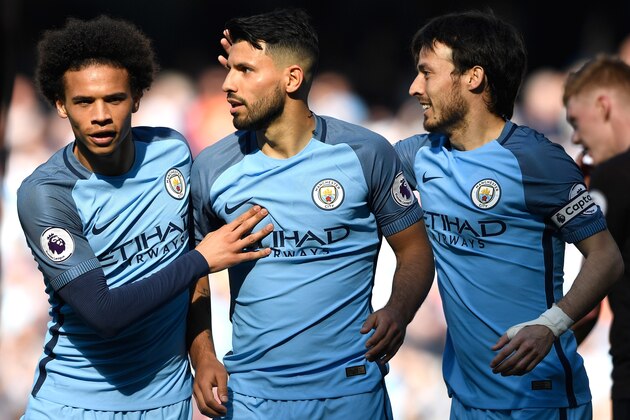 MANCHESTER, ENGLAND - APRIL 08: Sergio Aguero of Manchester City celebrates scoring his sides second goal with Leroy Sane of Manchester City and David Silva of Manchester City during the Premier League match between Manchester City and Hull City at Etihad Stadium on April 8, 2017 in Manchester, England.  (Photo by Stu Forster/Getty Images)