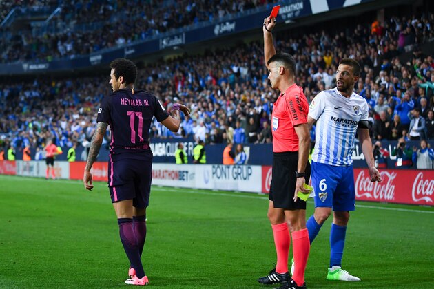 MALAGA, SPAIN - APRIL 08:  Neymar Jr. of FC Barcelona is shown a red card during the La Liga match between Malaga CF and FC Barcelona at La Rosaleda stadium on April 8, 2017 in Malaga, Spain.  (Photo by David Ramos/Getty Images)