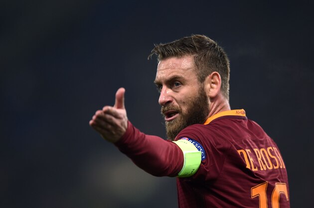 Roma midfielder from Italy Daniele De Rossi gestures during the Europa League Round of 16 return football match Roma vs Lyon at the Olympic Stadium in Rome on March 16, 2017.  / AFP PHOTO / FILIPPO MONTEFORTE        (Photo credit should read FILIPPO MONTEFORTE/AFP/Getty Images)