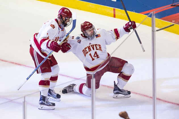 CHICAGO, IL - APRIL 8: Jarid Lukosevicius #14 of the Denver Pioneers celebrates his third goal of the game against the Minnesota Duluth Bulldogs during the 2017 NCAA Division I Men's Hockey Frozen Four Championship final at the United Center on April 8, 2017 in Chicago, Illinois. (Photo by Richard T Gagnon/Getty Images)