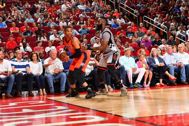 HOUSTON, TX - MARCH 26: Russell Westbrook #0 of the Oklahoma City Thunder looks to pass the ball against James Harden #13 of the Houston Rockets on March 26, 2017 at the Toyota Center in Houston, Texas. NOTE TO USER: User expressly acknowledges and agrees that, by downloading and/or using this photograph, user is consenting to the terms and conditions of the Getty Images License Agreement. Mandatory Copyright Notice: Copyright 2017 NBAE (Photo by Jesse D. Garrabrant/NBAE via Getty Images)