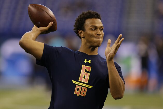 Notre Dame quarterback Deshone Kizer runs a drill at the NFL football scouting combine in Indianapolis, Saturday, March 4, 2017. (AP Photo/Michael Conroy)
