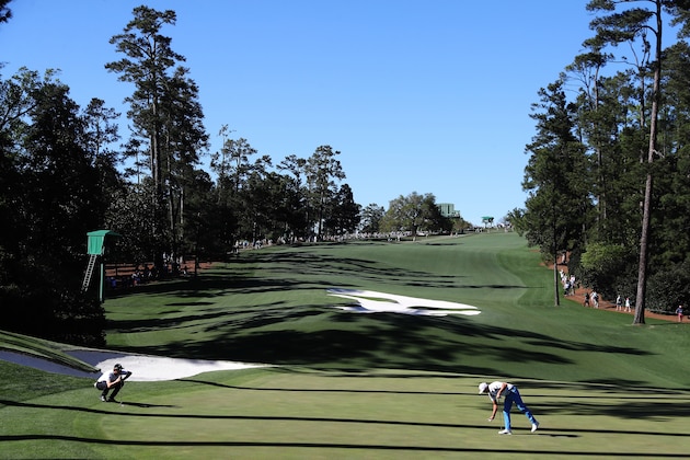 AUGUSTA, GA - APRIL 08:  Thomas Pieters of Belgium and Rickie Fowler of the United States mark their balls on the tenth green during the third round of the 2017 Masters Tournament at Augusta National Golf Club on April 8, 2017 in Augusta, Georgia.  (Photo by Rob Carr/Getty Images)
