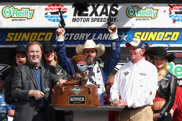 FORT WORTH, TX - APRIL 09:  Jimmie Johnson, driver of the #48 Lowe's Chevrolet, celebrates by shooting guns in Victory Lane after winning the Monster Energy NASCAR Cup Series O'Reilly Auto Parts 500 at Texas Motor Speedway on April 9, 2017 in Fort Worth, Texas.  (Photo by Chris Graythen/Getty Images)