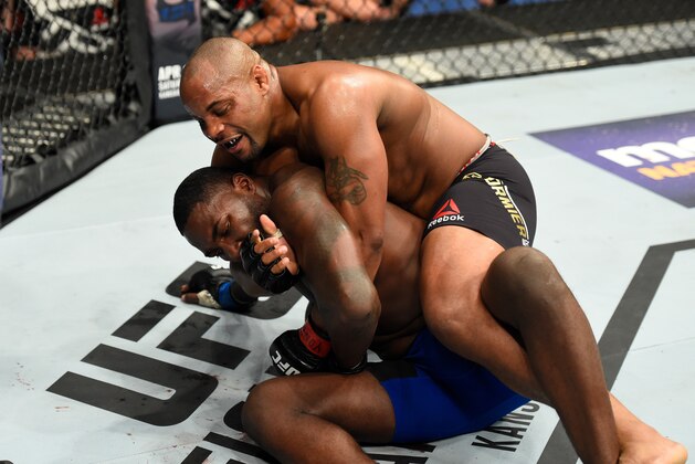 BUFFALO, NY - APRIL 08: Daniel Cormier takes down Anthony Johnson in their UFC light heavyweight championship bout during the UFC 210 event at KeyBank Center on April 8, 2017 in Buffalo, New York.  (Photo by Josh Hedges/Zuffa LLC/Zuffa LLC via Getty Images)