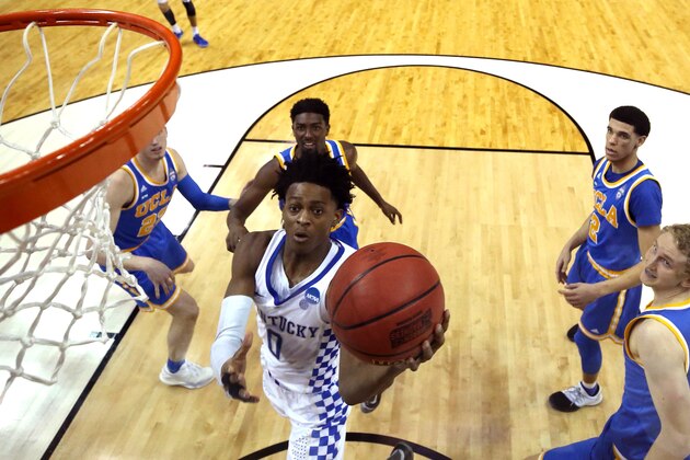 MEMPHIS, TN - MARCH 24: De'Aaron Fox #0 of the Kentucky Wildcats drives to the basket against the UCLA Bruins in the second half during the 2017 NCAA Men's Basketball Tournament South Regional at FedExForum on March 24, 2017 in Memphis, Tennessee.  (Photo by Andy Lyons/Getty Images)