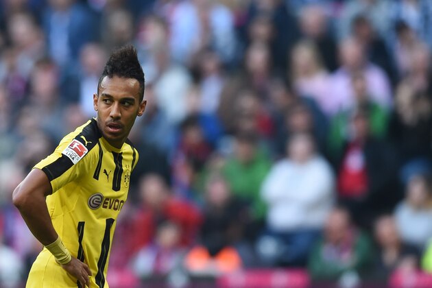 Dortmund's Gabonese striker Pierre-Emerick Aubameyang reacts during the German first division Bundesliga football match FC Bayern Munich v BVB Borussia Dortmund in Munich, southern Germany, on April 8, 2017. / AFP PHOTO / Christof STACHE / RESTRICTIONS: DURING MATCH TIME: DFL RULES TO LIMIT THE ONLINE USAGE TO 15 PICTURES PER MATCH AND FORBID IMAGE SEQUENCES TO SIMULATE VIDEO. == RESTRICTED TO EDITORIAL USE == FOR FURTHER QUERIES PLEASE CONTACT DFL DIRECTLY AT + 49 69 650050
        (Photo credit should read CHRISTOF STACHE/AFP/Getty Images)